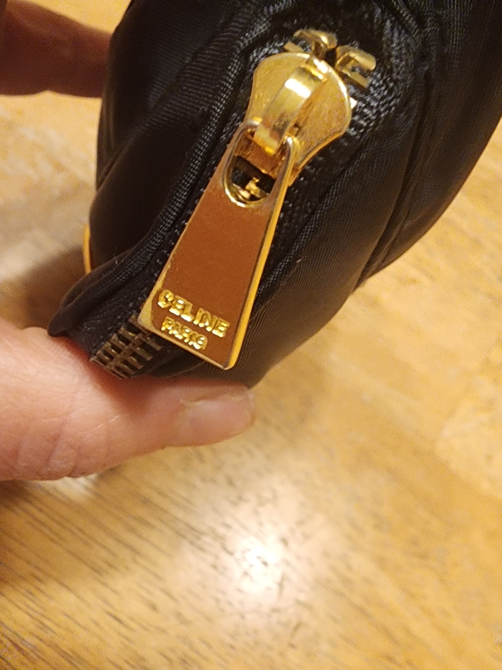 black nylon Celine cosmetic pouch featuring a gold-toned logo ring - Picture 4 of 9